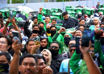 SURUHANJAYA Pekerja Gig diharap dapat memberi perlindungan dan pengiktirafan hak  dalam kerangka undang-undang pekerja di Malaysia. – UTUSAN/SYAKIR RADIN