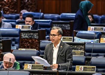 FAHMI Fadzil dalam sesi pertanyaan-pertanyaan bagi jawab lisan di Dewan Rakyat hari ini. - JABATAN PENERANGAN MALAYSIA