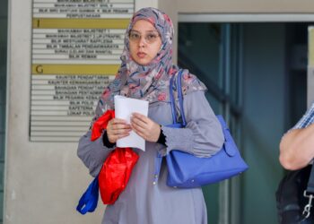 IDORA ketika hadir di Mahkamah Majistret di sini hari ini. -UTUSAN/ SHIDIQQIM