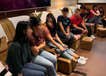 SEBAHAGIAN warga asing yang ditahan dalam serbuan di salah sebuah pusat urut di Bukit Bintang.