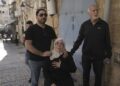 NORA Sub Laban ditenangkan ahli keluarga apabila diusir dari rumah mereka untuk memberi laluan kepada peneroka Israel di Kota Lama Baitulmuqadddis pada 11 Julai tahun lalu. -AGENSI