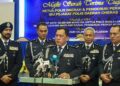 RUSDI Mohd. Isa (tengah) bercakap kepada pemberita pada sidang akhbar di Ibu Pejabat Polis Daerah (IPD) Cheras, hari ini.