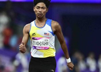 Muhammad Azeem Fahmi berjaya menebus kekecewaannya selepas memenangi emas bersama kuartet 4x100 meter Universiti Auburn selepas gagal dalam acara 100m di Amerika Syarikat, semalam. - AFP