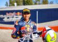 HAKIM Danish bersama trofi yang dimenanginya selepas muncul naib juara pada perlumbaan 2 dalam aksi pembukaan Red Bull MotoGP Rookies Cup 2024 di Litar Jerez, Sepanyol, semalam. - IHSAN ZK Racing