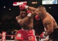Mike Tyson (kanan) bertarung dengan juara WBC Frank Bruno pada 1996. Tyson akan membuat perhitungan dengan Jake Paul dalam pertarungan profesional pada 20 Julai ini. – AFP