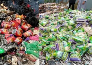 ANTARA sebahagian beras dan sardin yang dibuang di kawasan pembuangan sampah dekat Rumpun Makmur, Kuala Krau di Temerloh, Pahang.