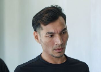 Kes bekas pemain bola sepak Sabah FC, Mohd. Rizal Mohd. Ghazali yang didakwa memukul teman wanitanya.UTUSAN/FARIZ ROSADIO