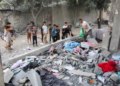 RAKYAT Palestin memeriksa tapak serangan Israel ke atas sebuah rumah, di tengah-tengah konflik berterusan antara Israel dan kumpulan Islam Palestin Hamas, di Rafah, di selatan Semenanjung Gaza,semalam. -REUTERS