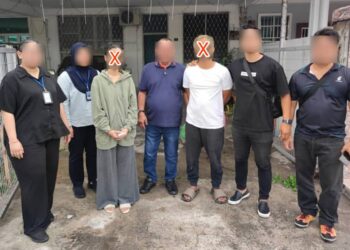 PASANGAN suami isteri yang ditahan kerana memiliki syabu di Penampang, Sabah. - IHSAN IPD PENAMPANG