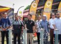 ADAM Adli melakukan gimik praperlancaran Sambutan Hari Belia Negara Peringkat Kebangsaan di Menara Taming Sari, Melaka, baru-baru ini. – UTUSAN/SYAFEEQ AHMAD