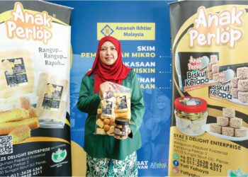 NORHAYATI Yahaya bangkit semula dalam perniagaan biskut kelapa dengan bantuan daripada Amanah Ikhtiar Malaysia (AIM)  selepas merudum akibat pandemik Covid-19 yang melanda negara pada 2020.