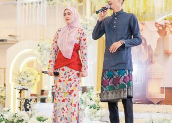 DEN Manjo (kanan) bersama Eda Ezrin mencipta sejarah diangkat sebagai pemenang kategori Lagu Etnik Terbaik pada Anugerah Industri Muzik (AIM) Ke-24 kelmarin.
