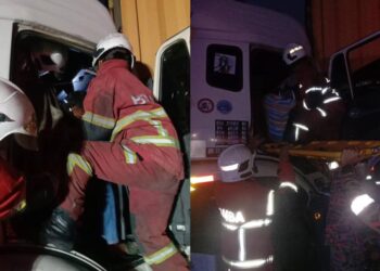 ANGGOTA bomba membawa keluar pemandu lori tersepit dalam kejadian di kilometer (KM) 44, Lebuh Raya Utara-Selatan, Gombak, pagi tadi.