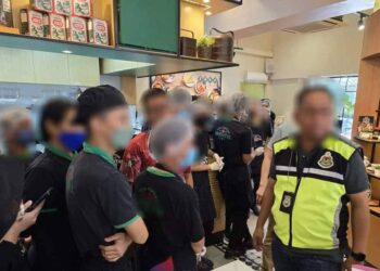 SEBAHAGIAN daripada pekerja asing yang ditahan dalam Op Selera di Johor Bahru.