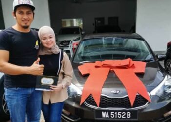 HASNAH HUSSIN bersama suaminya, Muhammad Faez Zainuddin yang dilaporkan hilang bersama kereta Kia Cerato berwarna kelabu gelap sejak 25 Julai lalu.