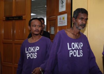 V. SUPRAMANY (kanan) dan Muhammad Amir Rashid Masri dijatuhi hukuman penjara 14 hari oleh Mahkamah Majistret Teluk Intan selepas gagal memberi penjelasan memuaskan berkaitan pemilikan 40 biji kelapa. - UTUSAN