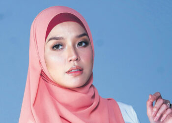 NONNY mengejutkan ramai pihak tahun lepas apabila melepaskan imej berhijab.