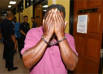 P. KUMAR mengaku bersalah atas tuduhan mengugut mahu mencederakan isterinya di Mahkamah Majistret Teluk Intan, hari ini. - UTUSAN/MUHAMAD NAZREEN SYAH MUSTHAFA