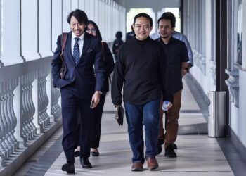 Wan Saiful Wan Jan  hadir di Mahkamah Sesyen Kuala Lumpur bagi perbicaraan kes rasua dan AMLA berkaitan Jana Wibawa.  UTUSAN/M. FIRDAUS M. JOHARI