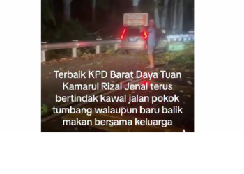 RAZARUDIN Husain memuji sikap anggota polis membantu mengawal lalu lintas yang sesak akibat pokok tumbang walaupun pada waktu tidak bertugas. - MEDIA SOSIAL