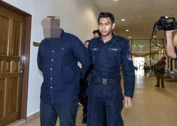 SUAMI kepada pelakon dan bekas peragawati terkemuka tanah air direman tiga hari bermula hari ini ketika dihadapkan ke Mahkamah Majistret di Kuantan, Pahang. - FOTO/SHAIKH AHMAD RAZIF