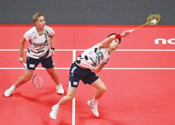 CHENG Tang Jie-Toh Ee Wei mara ke pusingan kedua Terbuka Singapura hari ini. - AFP