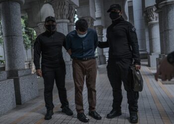 SEORANG bekas pegawai khidmat pelanggan di IKN didenda RM5,000 oleh Mahkamah Majistret Putrajaya. - UTUSAN/FAIZ ALIF ZUBIR