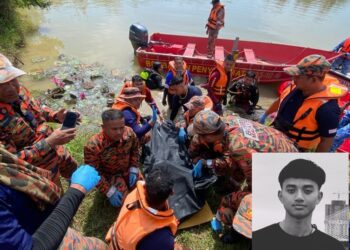ANGGOTA bomba mengangkat mayat Nur Haidhar Nasrul (gambar kecil) yang ditemukan mati lemas setelah terjatuh dalam Sungai Padang Terap, Pendang, Kedah.