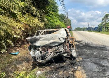 KEADAAN kereta yang terbakar selepas melanggar sebuah lori polis dalam kemalangan Jalan Bukit Cerakah, Kapar, Klang, Selangor awal pagi tadi.