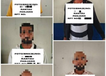 PATI warganegara Pakistan yang ditahan semasa melalui sekat pintas Serongga, Rantau Panjang, Kelantan.-IHSAN PGA.