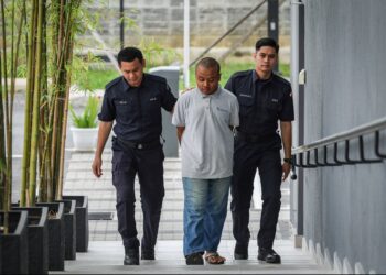 MUHAMAD Adam Haiqal Abdullah telah menukar pengakuan bersalah selepas pertuduhan dibacakan semula dalam prosiding di Mahkamah Ampang di sini hari ini. - UTUSAN/IQBAL ROSLI