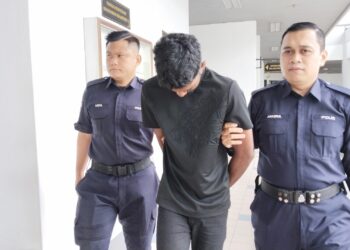 K. Mageshwaran mengaku tidak bersalah di Mahkamah Majistret, Ayer Keroh, Melaka atas pertuduhan melakukan ugutan dan merosakkan kereta milik bekas kekasih. UTUSAN/MUHAMMAD SHAHIZAM TAZALI