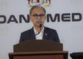 FAHMI Fadzil pada sidang akhbar mingguan di Putrajaya, semalam. - UTUSAN/FAISOL MUSTAFA