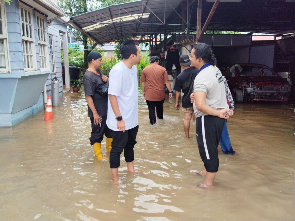 Hujan lebat air pasang