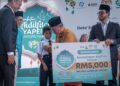 MOHD. Na'im Mokhtar ketika Majlis Serahan Sumbangan dan Pelancaran Bangunan Ibu Pejabat Baharu Yayasan Pembangunan Ekonomi Islam Malaysia (YAPIEM) di Putrajaya. - UTUSAN/FAIZ ALIF ZUBIR