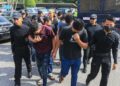 SERAMAI 12 ahli Geng Apan Sungai Petani yang dituduh mencuri kabel dibawa ke Mahkamah Majistret Marang, Terengganu. - UTUSAN/PUQTRA HAIRRY ROSLI