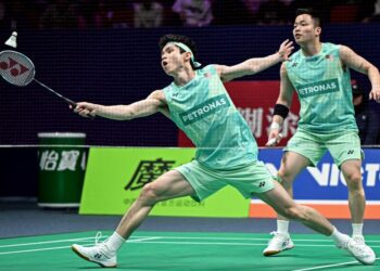 AKSI Aaron Chia-Soh Wooi Yik ketika tewas kepada beregu Jepun, Takuro Hoki-Yugo Kobayashi.- AFP