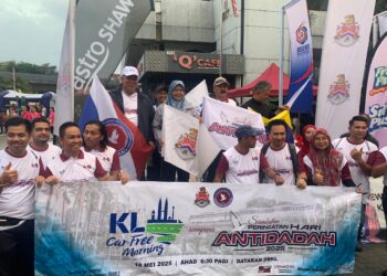 Ruslin Jusoh (atas, dua kanan) bersama Maimunah Sharif ketika perasmian Program Kl Car Free Morning sempena Sambutan Peringatan Hari Antidadah Tahun 2025 di Kuala Lumpur, hari ini.