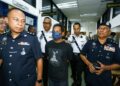 RUDI Zulkarnain Mat Radi didakwa  di Mahkamah Majistret Teluk Intan hari ini. - UTUSAN/MUHAMAD NAZREEN SYAH MUSTHAFA