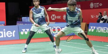 AKSI gandingan remaja negara, Kang Khai Xing-Aaron Tai menumpaskan beregu utama India di Kejohanan Badminton All England.