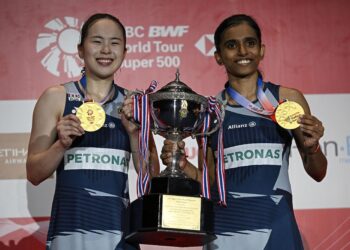 Pearly Tan-M. Thinaah menjuarai Kejohanan Badminton Terbuka Thailand .-AFP