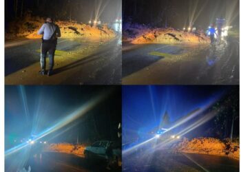 KEADAAN cerun tanah runtuh menghalang laluan di Kilometer 27, Jalan Gua Musang-Kuala Krai dekat Gua Sejuk, Gua Musang, Kelantan hari ini.-IHSAN POLIS.