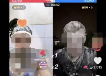 TANGKAP layar yang diambil daripada satu siaran langsung di TikTok menunjukkan dua anak muda sedang aktif melakukan trend ‘PK Battle’