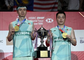 BEREGU lelaki negara, Aaron Chia-Soh Wooi Yik menaiki dua anak tangga ranking dunia selepas menjuarai Kejohanan Badminton Terbuka Thailand 2025 di Bangkok pada Ahad. - AFP