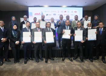 13 syarikat pengendali umrah tempatan menjalinkan kerjasama strategik dengan Amal by Malaysia Airlines bagi musim umrah 1447H di Putrajaya. - UTUSAN/MOHD HUSNI MOHD NOOR