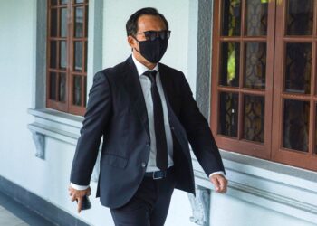 MOHD. Khairul Akmal Mohd. Jasni mengaku tidak bersalah terhadap pertuduhan mendedahkan maklumat sulit Petroliam Nasional Berhad (Petronas) kepada Syarikat Petroleum Sarawak (Petros). - UTUSAN/ISKANDAR ISHAK