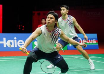 GOH Sze Fei-Nur Izzuddin Rumsani tewas kepada Man Wei Chong-Tee Kai Wun 19-21, 21-7, 21-16 pada aksi suku akhir Malaysia Masters 2025 di Axiata Arena, kelmarin. - UTUSAN/ISKANDAR ISHAK