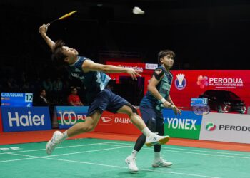 AARON Tai-Kang Khai Xin tewas kepada beregu Denmark Rasmus Kjaer-Frederick Sogaard 10-21, 26-24, 16-21 pada aksi pusingan kedua Malaysia Masters 2025 di Axiata Arena, Bukit Jalil, hari ini. - UTUSAN/ISKANDAR ISHAK