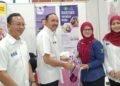 MOHD. JAFNI Md. Shukor (kanan) pada majlis Karnival TVET dan Kerjaya Kulai di Bandar Putra, Kulai.