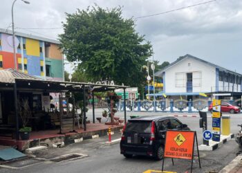 MPK akan menyelesaikan isu-isu terpencil berkaitan pelaksanaan sistem parkir pintar bagi memberi kemudahan kepada para pengguna di Kangar, Perlis semalam. - UTUSAN/ASYRAF MUHAMMAD